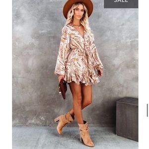 LUXXEL brand beige romper, VICI collection.